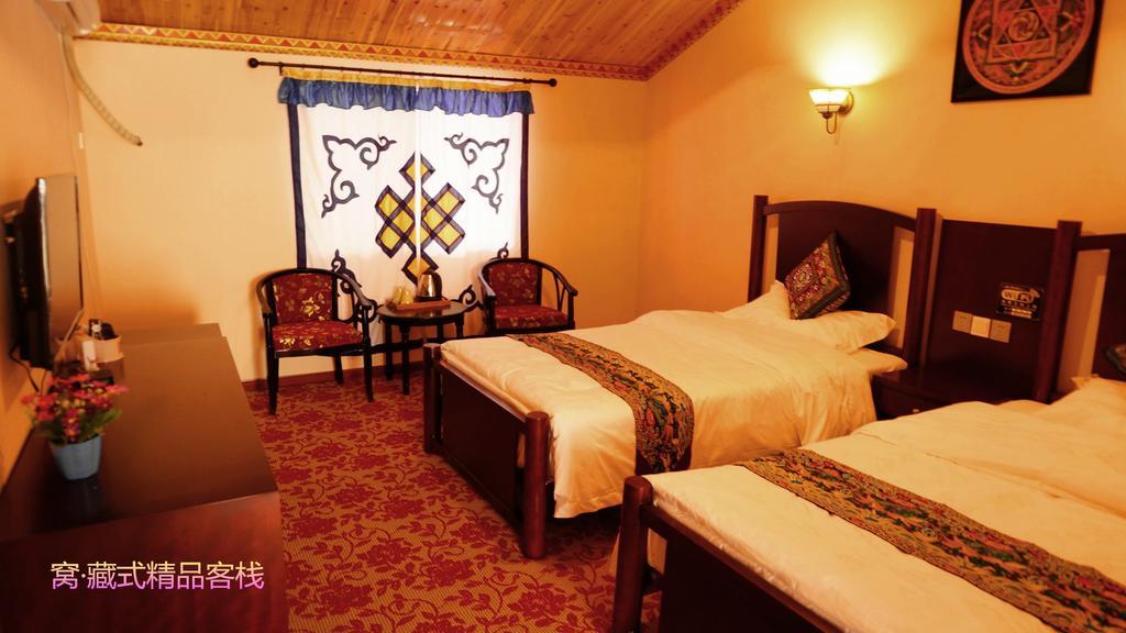 Wo Home Hostel Jiuzhaigou Rom bilde